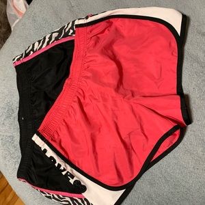 Pink and black workout shorts